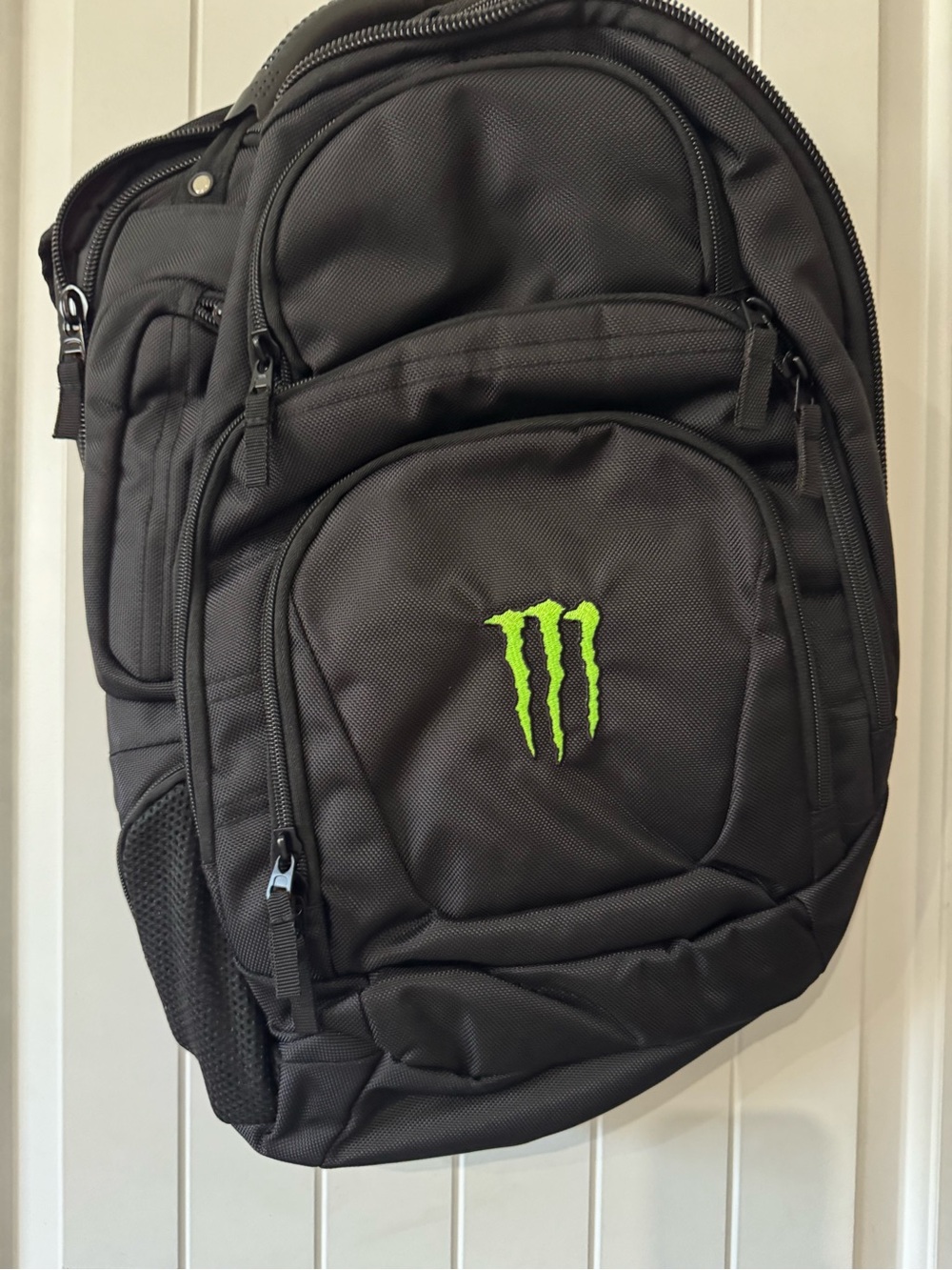 Black Backpack with Green Accent Logo - Men's Travel & Everyday Pack